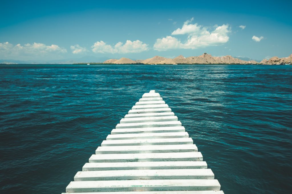 Close-up pier leading to the ocean. Komodo island